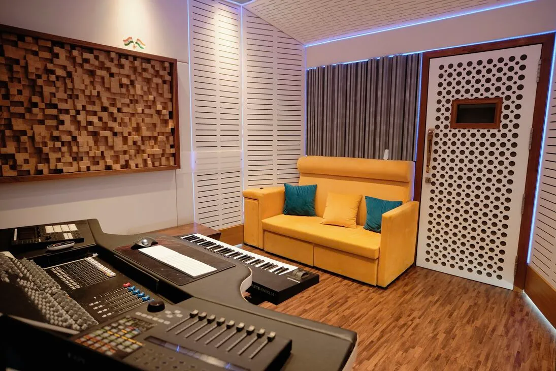 Monitor room lounge area with keyboards and seating